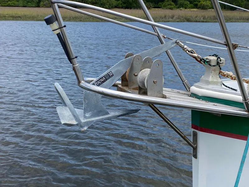 Slide: The Image of Anchor on 1986 Nonsuch 30 Ultra sailboat in calm waters. - 4