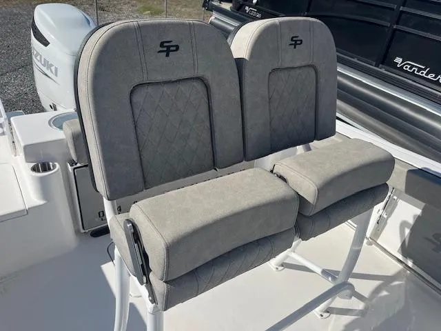 Slide: The Image of 2023 Sea Pro 219CC boat seats with gray upholstery and SP logo. - 6