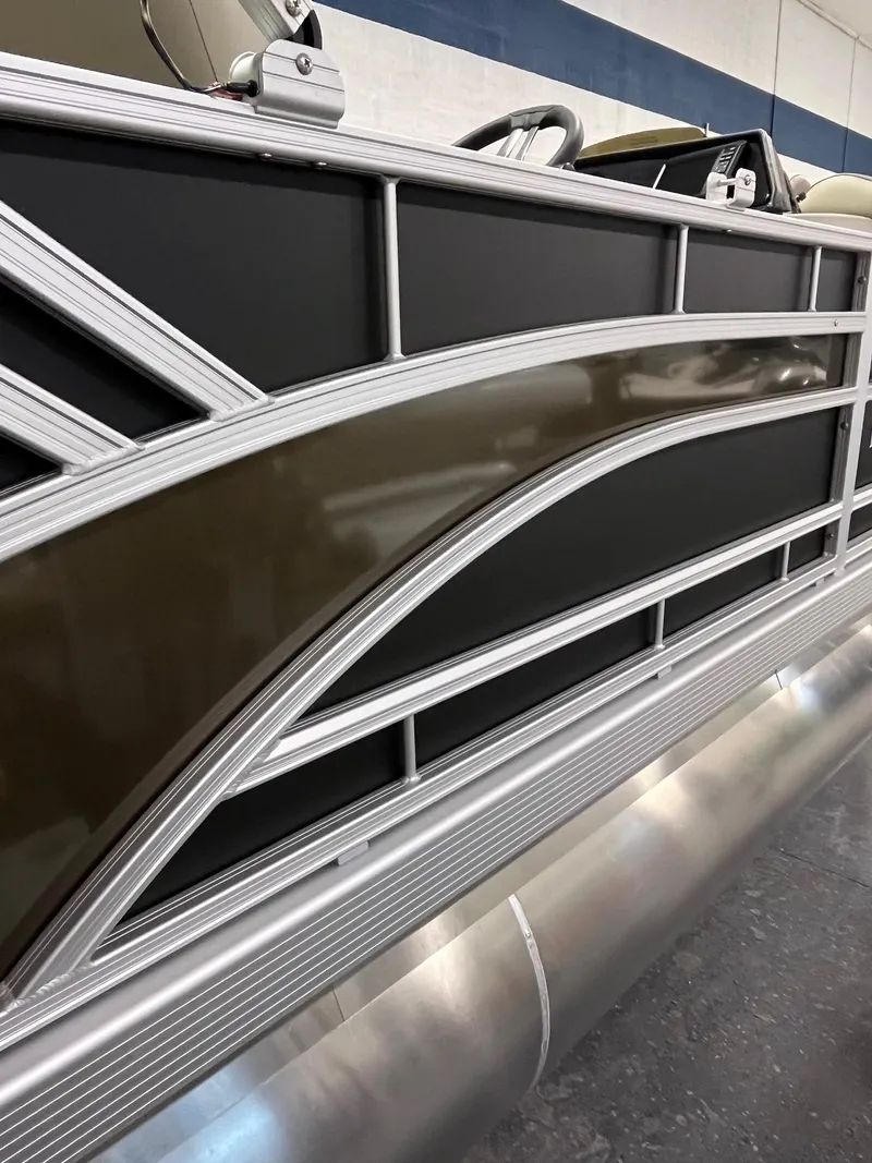 Slide: The Image of 2025 Bennington 188 SL pontoon boat with sleek metallic design. - 3