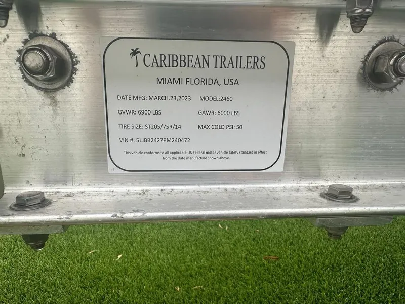 Slide: The Image of Caribbean Trailers label on metal, Miami, Florida, USA, model 2460, manufactured March 23, 2023. - 21