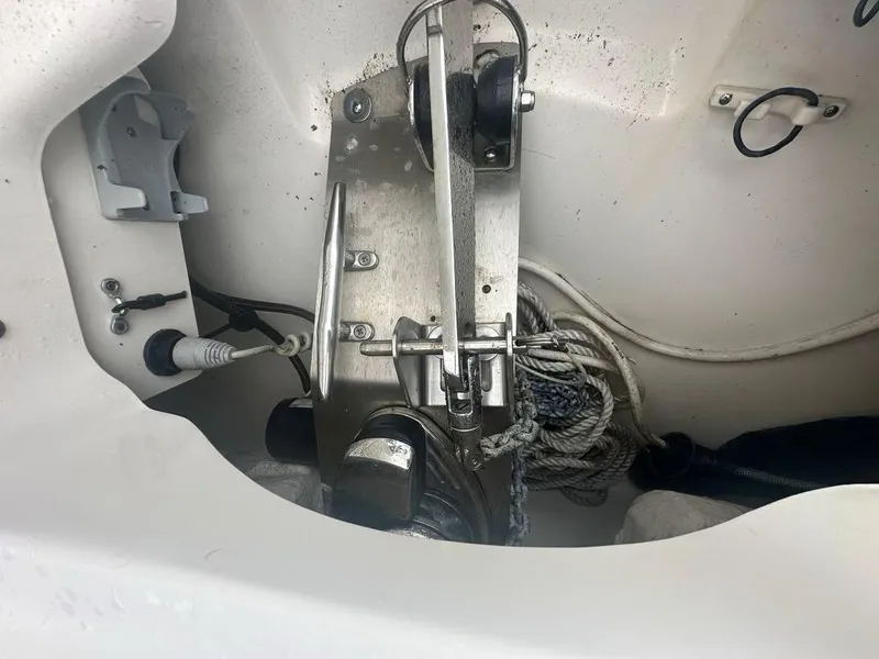 Slide: The Image of Anchor compartment of 2020 Boston Whaler 230 Vantage with ropes and metal fittings. - 22