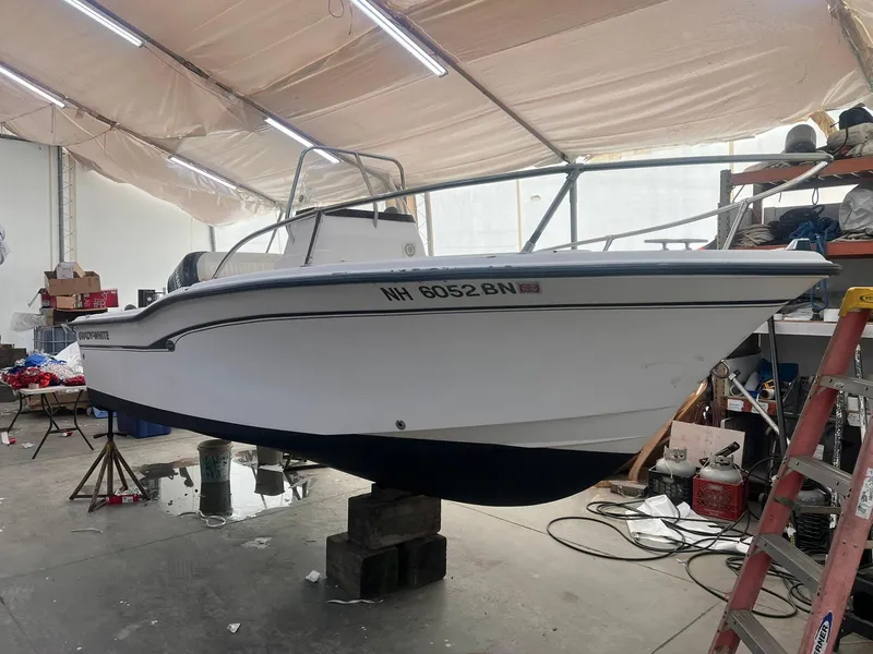 Slide: The Image of 2001 Grady-White Sportsman 180 boat in a workshop setting. - 3