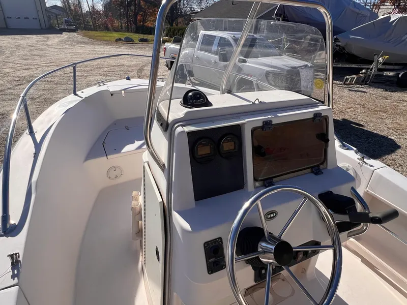 Slide: The Image of 2001 Grady-White Sportsman 180 boat interior with steering wheel and console. - 5