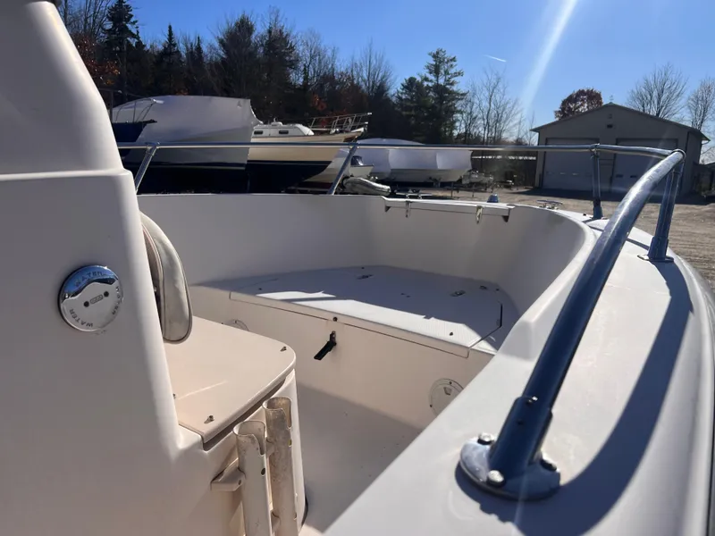 Slide: The Image of 2001 Grady-White Sportsman 180 boat, interior view, sunny day, parked outdoors. - 7