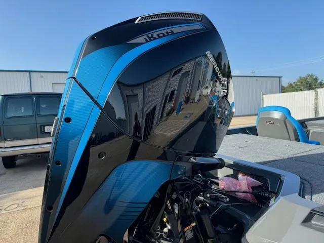 Slide: The Image of Trailer hitch of iKon LXL21 boat, 2025 model, on asphalt surface. - 12