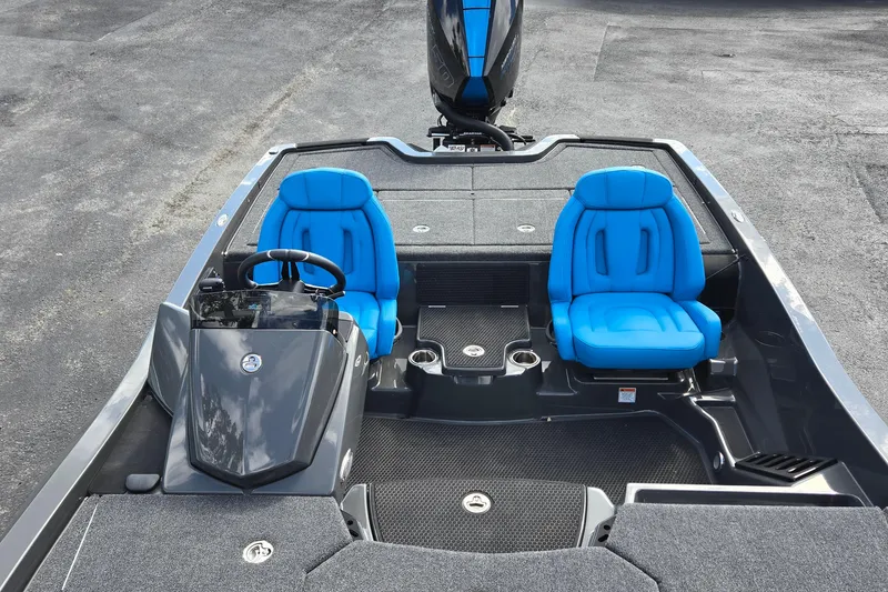 Slide: The Image of 2025 iKon LXL21 boat interior with blue seats and sleek design. - 14