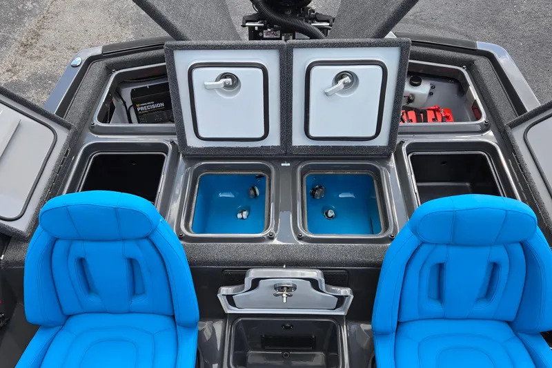 Slide: The Image of 2025 iKon LXL21 boat interior with blue seats and storage compartments. - 17