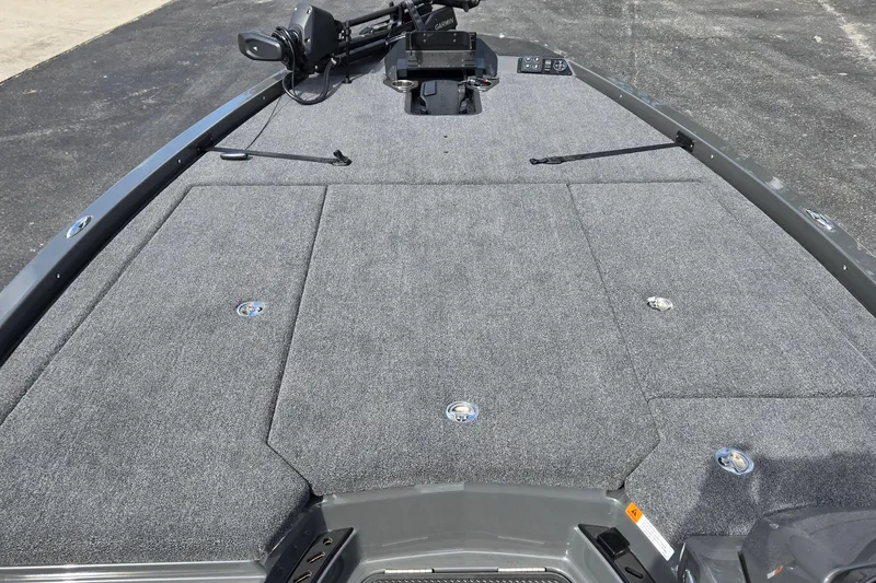Slide: The Image of Front deck of 2025 iKon LXL21 boat with carpeted surface and mounted equipment. - 22