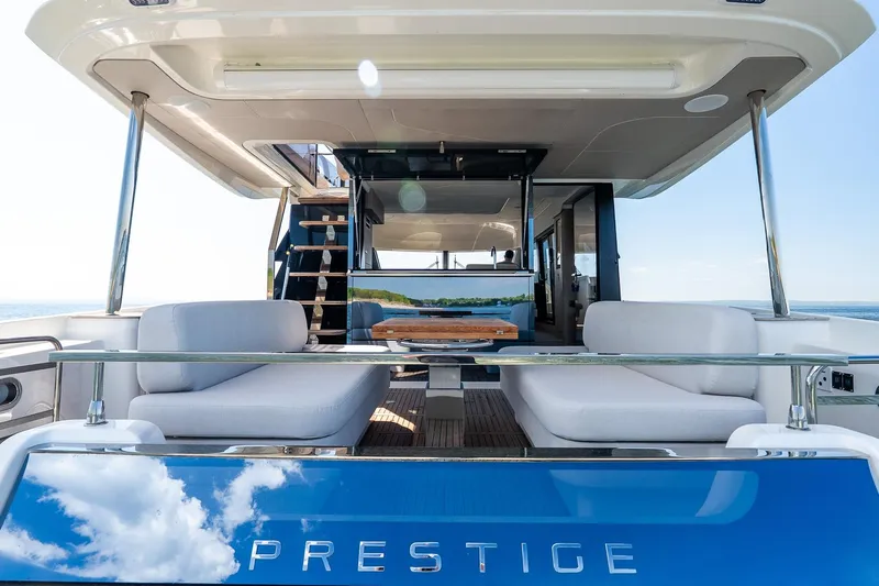 Slide: The Image of Luxurious 2026 Prestige F5.7 yacht with spacious outdoor seating and elegant design. - 44