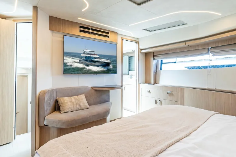 Slide: The Image of Luxurious Prestige F5.7 yacht interior, featuring modern design and comfortable seating, 2026 model. - 67