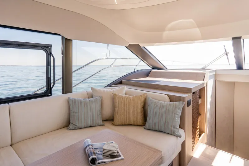 Slide: The Image of Luxurious interior of 2026 Prestige F5.7 yacht with elegant seating and ocean view. - 57