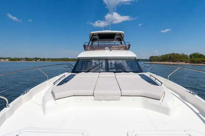 Slide: The Image of Luxury Prestige F5.7 yacht, 2026 model, cruising on a sunny day. - 17