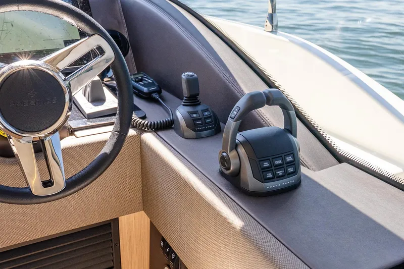 Slide: The Image of Cockpit of 2026 Prestige F5.7 yacht with steering wheel and control panel. - 26