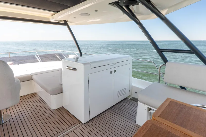 Slide: The Image of Luxurious Prestige F5.7 yacht deck with seating, ocean view, and modern amenities, 2026 model. - 33