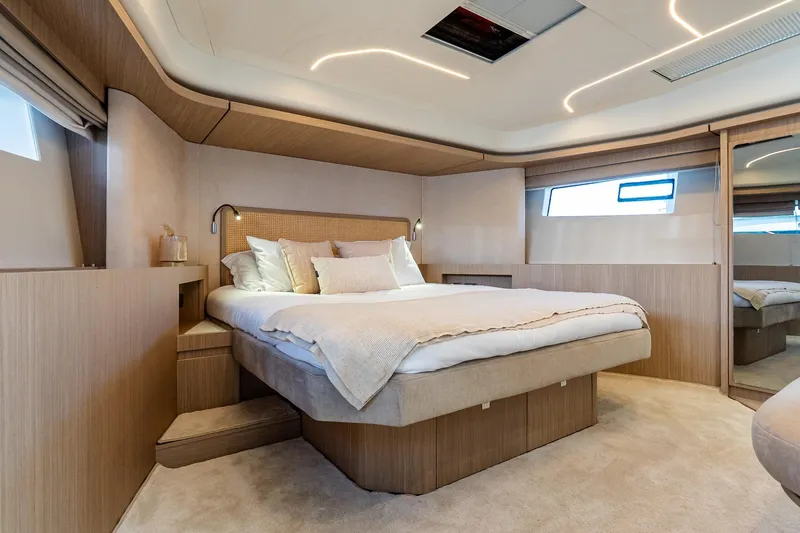 Slide: The Image of Luxurious bedroom interior of 2026 Prestige F5.7 yacht, featuring modern design and elegant furnishings. - 65
