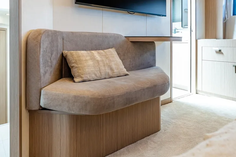 Slide: The Image of Luxurious interior seating in 2026 Prestige F5.7 yacht, featuring plush cushions and modern design. - 68