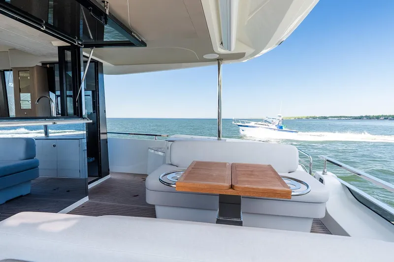 Slide: The Image of Luxurious Prestige F5.7 yacht interior, 2026 model, with ocean view and sleek design. - 43