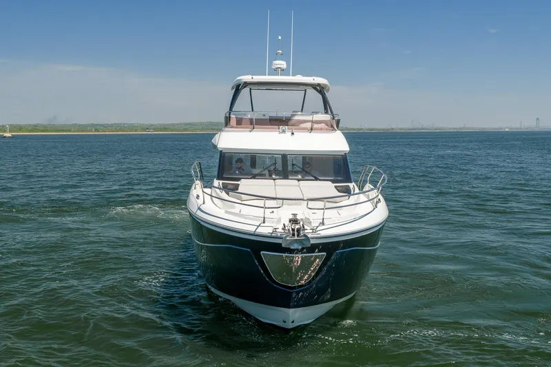 Slide: The Image of Luxury Prestige F5.7 yacht cruising on open water, 2026 model. - 9