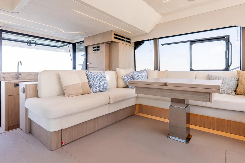 Slide: The Image of Luxurious interior of 2026 Prestige F5.7 yacht with modern seating and elegant decor. - 55