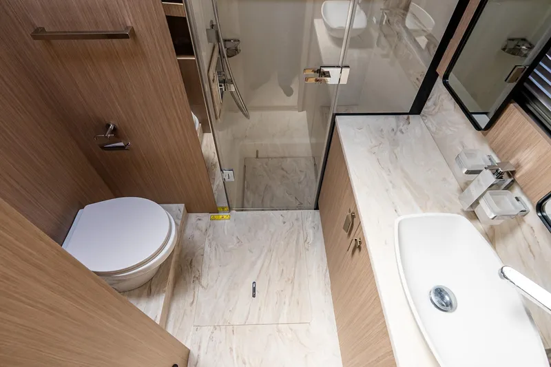 Slide: The Image of Modern bathroom in 2026 Prestige F5.7, featuring sleek design, marble surfaces, and glass shower. - 70