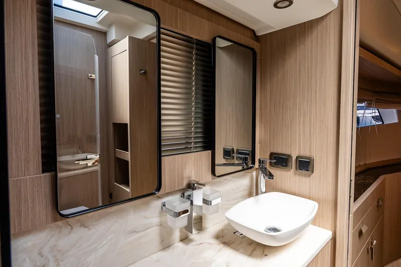Slide: The Image of Luxurious bathroom interior of 2026 Prestige F5.7 yacht with modern fixtures and elegant design. - 72