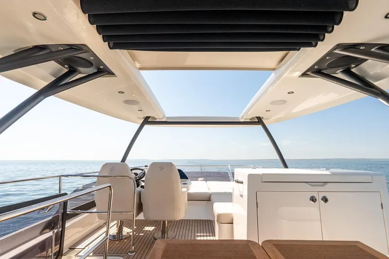 Slide: The Image of Luxurious 2026 Prestige F5.7 yacht interior with open deck and ocean view. - 30