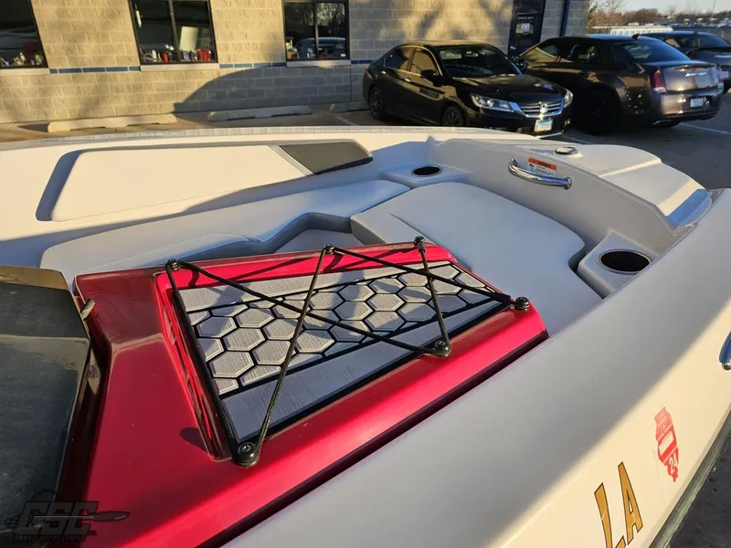 Slide: The Image of 2018 Scarab 165 ID boat with red accents and storage netting. - 29