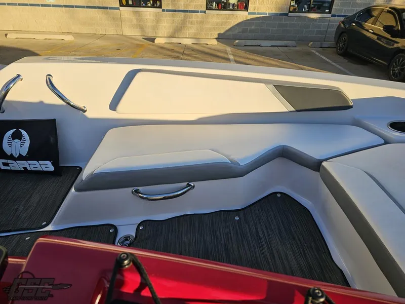 Slide: The Image of 2018 Scarab 165 ID boat interior with seating and logo detail. - 31