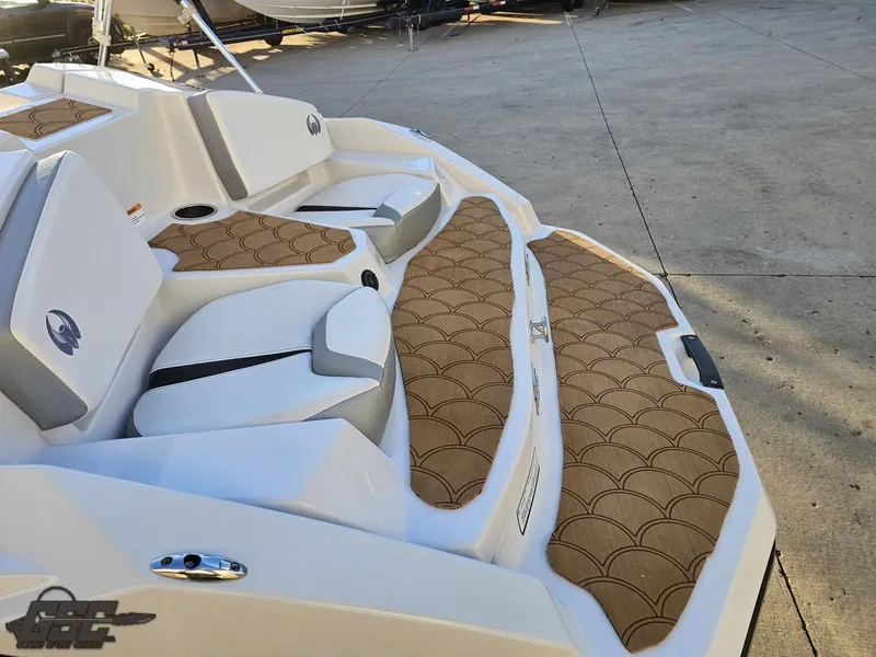 Slide: The Image of 2018 Scarab 165 ID boat interior with stylish seating and patterned flooring. - 37