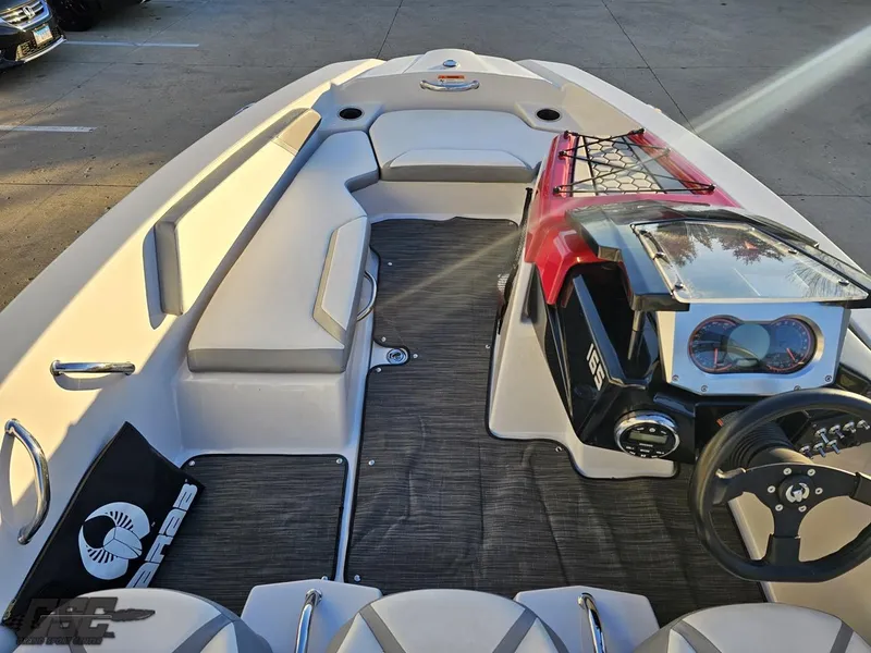 Slide: The Image of 2018 Scarab 165 ID boat interior with modern dashboard and seating. - 42