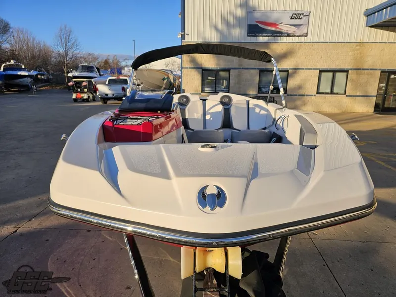 Slide: The Image of 2018 Scarab 165 ID boat in a marina, front view, sunny day. - 9