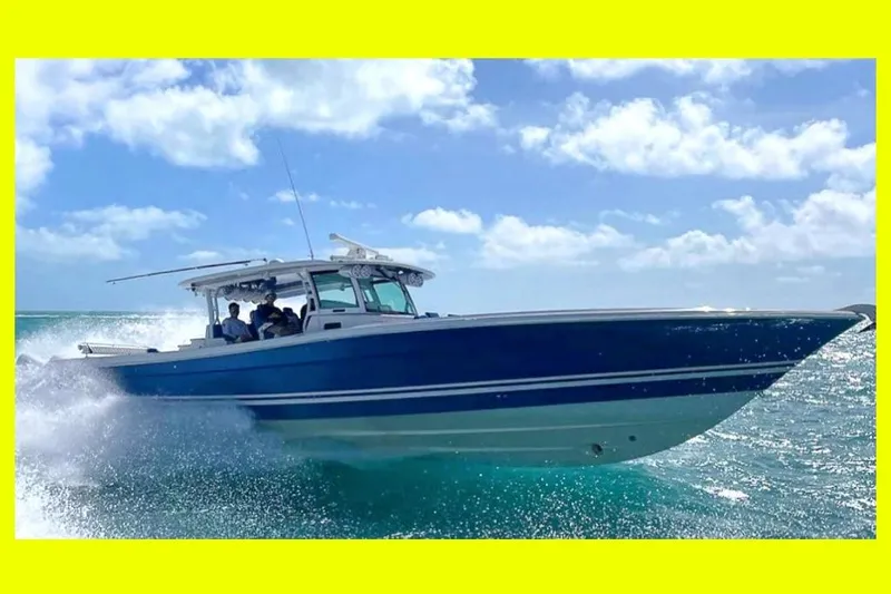 Slide: The Image of 2018 Hydra-Sports 5300 Suenos boat cruising on open water under a clear sky. - 0