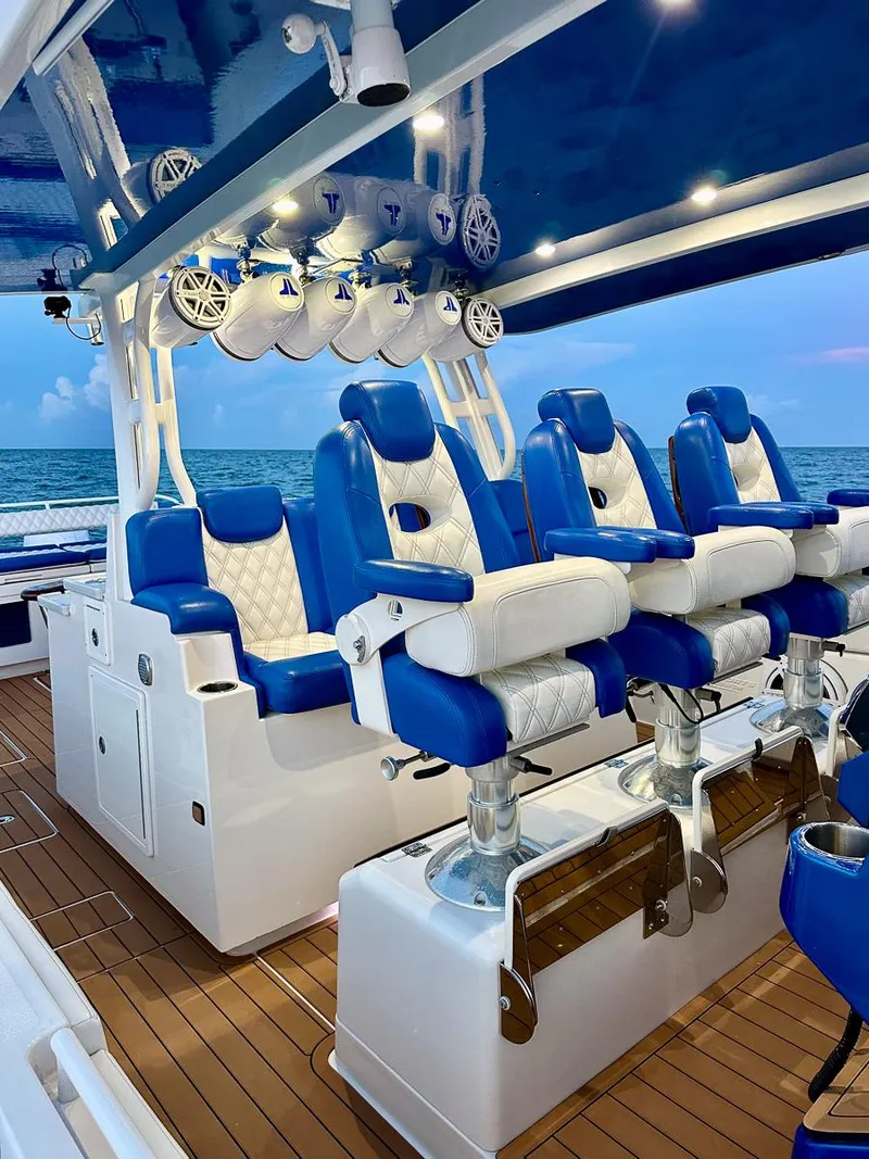 Slide: The Image of 2018 Hydra-Sports 5300 Suenos boat with luxurious blue and white seating. - 3