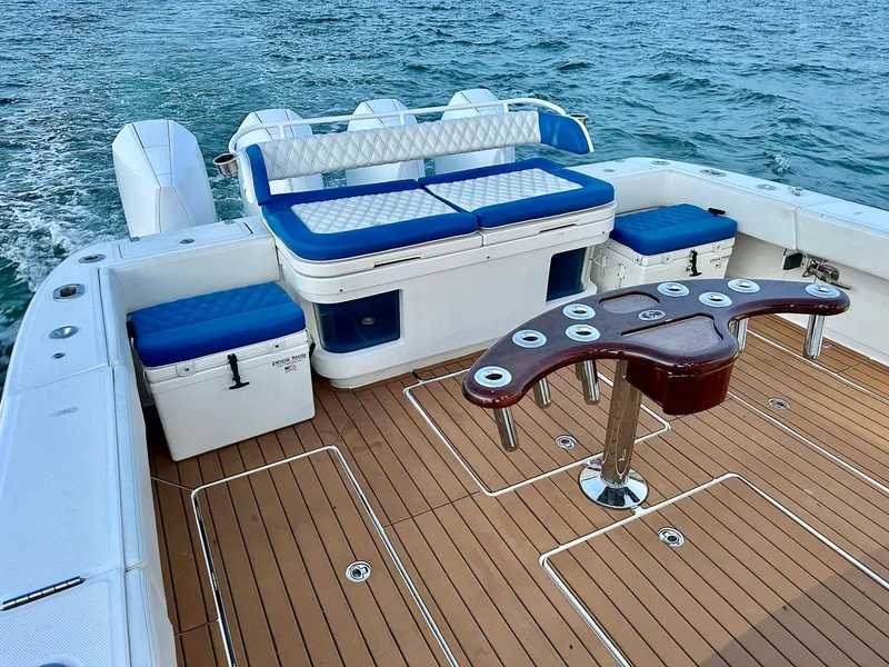 Slide: The Image of 2018 Hydra-Sports 5300 Suenos boat deck with seating and fishing rod holders. - 7
