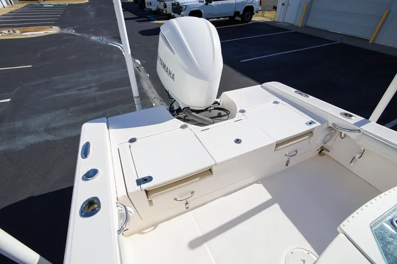 Slide: The Image of 2017 Everglades 253 Center Console boat with Yamaha engine in parking lot. - 10