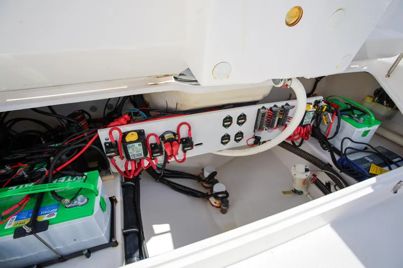 Slide: The Image of 2017 Everglades 253 Center Console boat electrical system with batteries and wiring. - 13