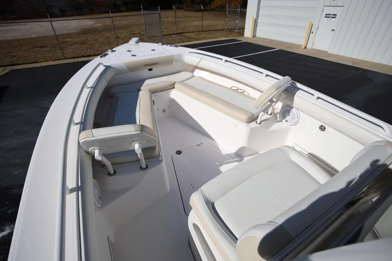 Slide: The Image of 2017 Everglades 253 Center Console boat interior with seating and steering wheel. - 20