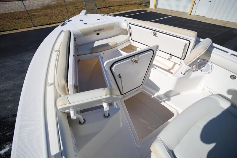 Slide: The Image of 2017 Everglades 253 Center Console boat interior with open storage compartments. - 21