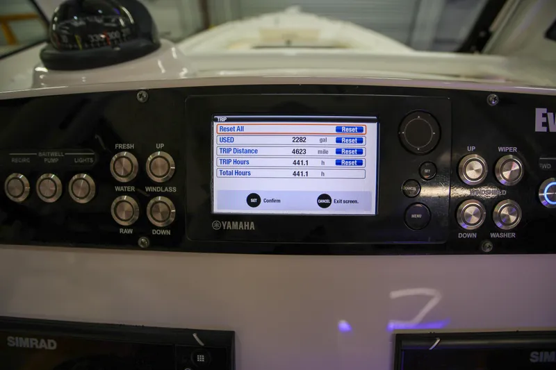 Slide: The Image of Control panel of 2017 Everglades 253 Center Console boat with trip data display. - 26