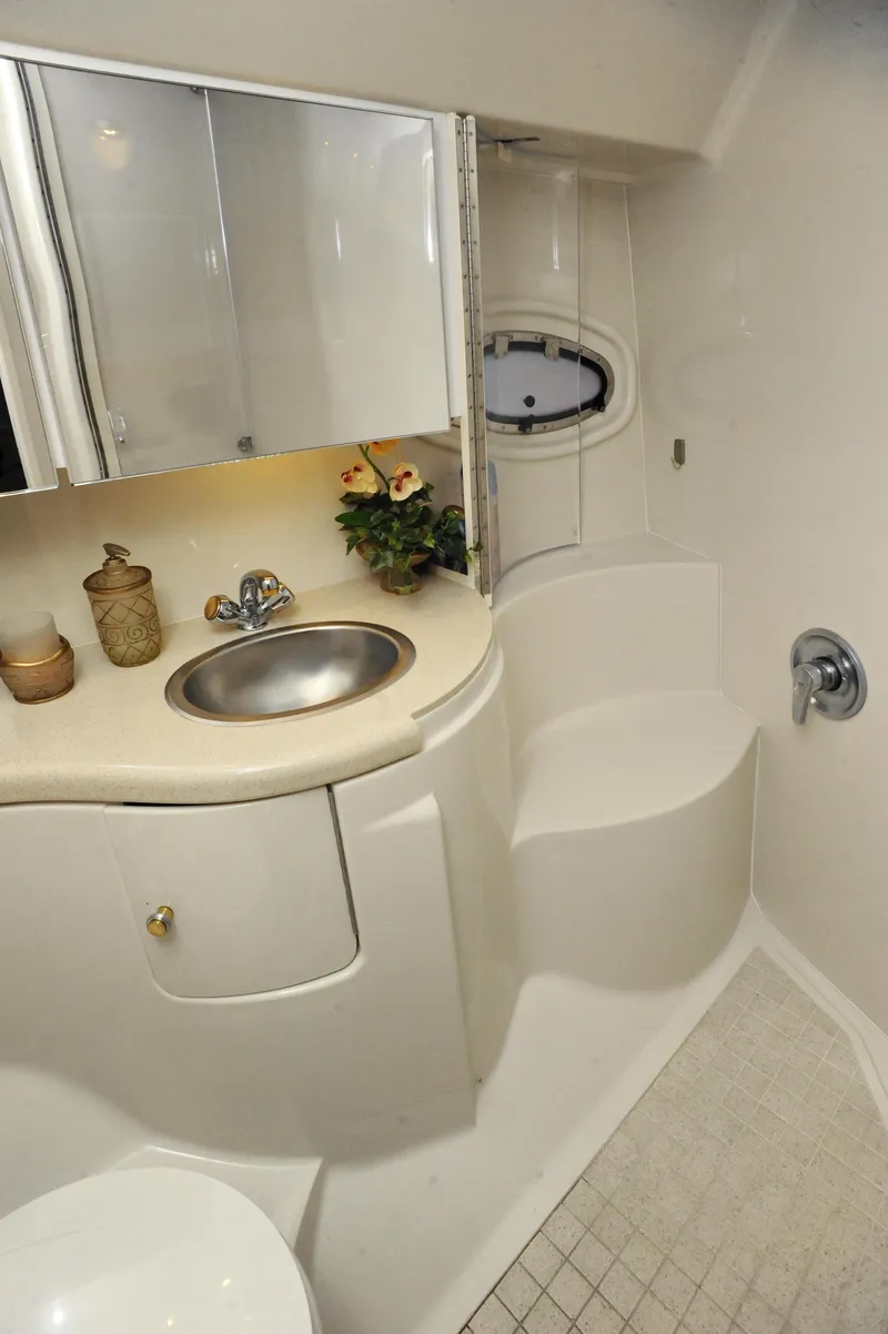 Slide: The Image of Luxurious bathroom in 2001 Regal Commodore 4160 yacht with modern fixtures. - 16