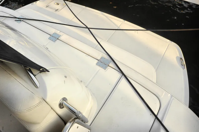 Slide: The Image of 2001 Regal Commodore 4160 boat deck with ropes and seating. - 31