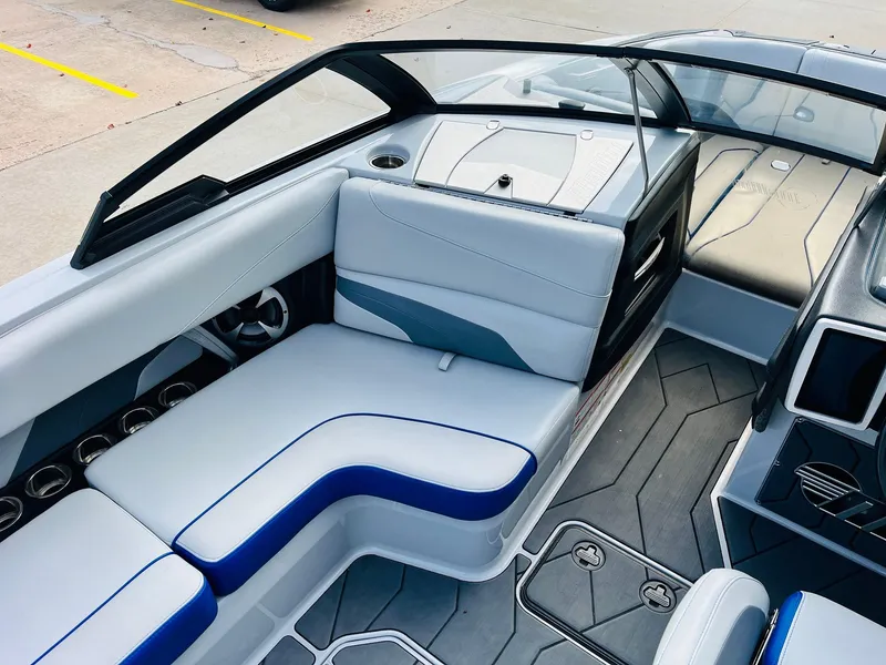 Slide: The Image of 2020 Malibu Wakesetter 24 MXZ interior with sleek seating and modern design. - 17