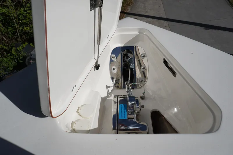 Slide: The Image of Anchor compartment of 2021 Sea Pro 259 Center Console boat. - 13