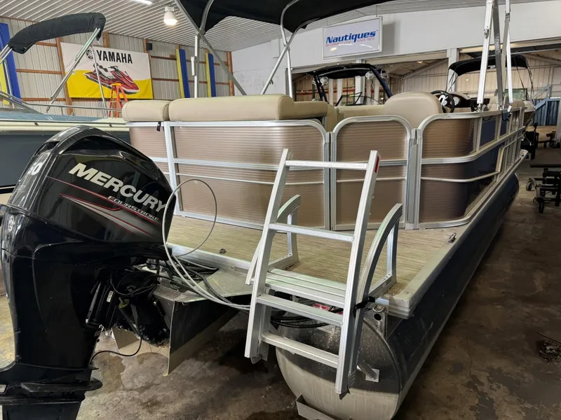 Slide: The Image of 2018 Misty Harbor 2085 Adventure CR pontoon boat with Mercury outboard motor in showroom. - 10