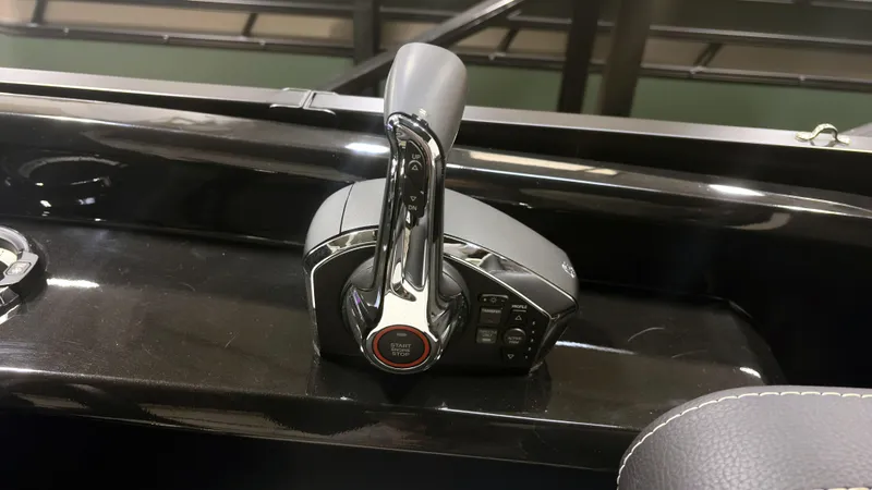 Slide: The Image of Viaggio Diamante U 2024 boat throttle control on sleek black dashboard. - 7