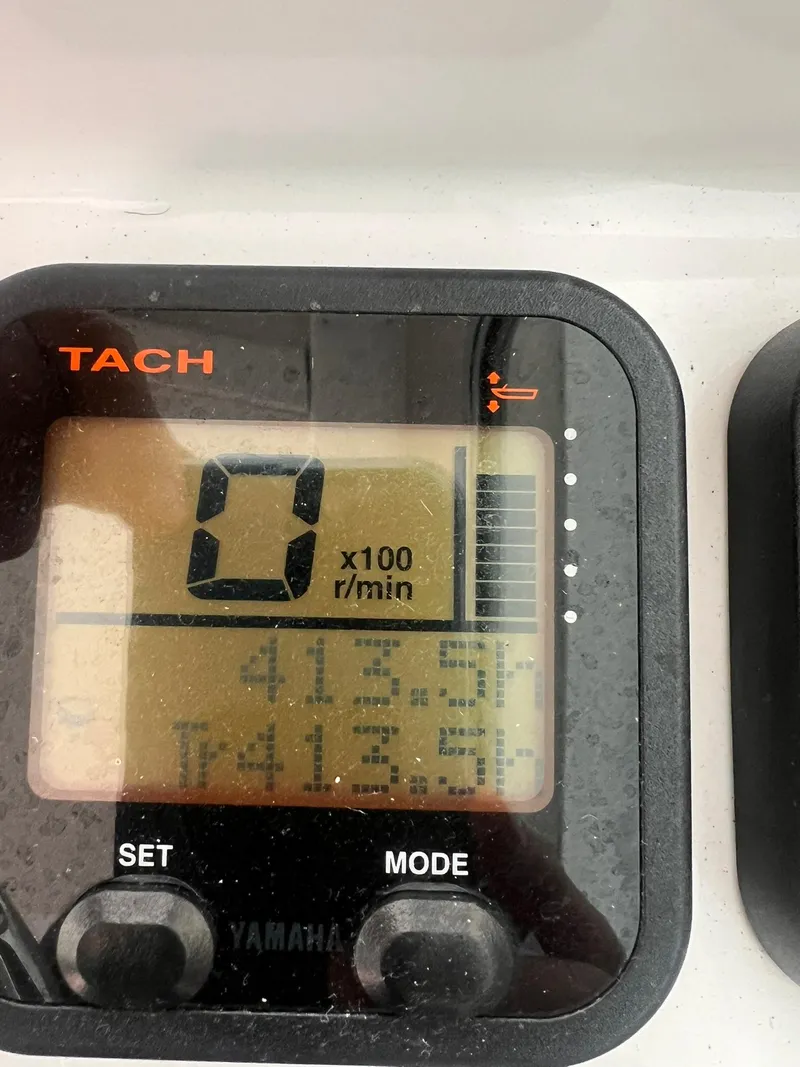 Slide: The Image of Close-up of a Yamaha tachometer on a 2016 Steiger Craft 23 Miami boat. - 10