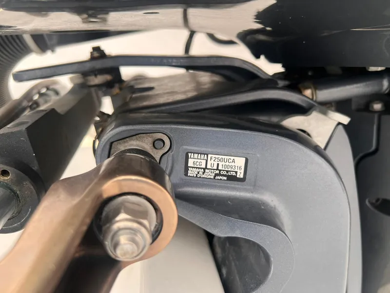 Slide: The Image of Close-up of Yamaha F250UCA engine part on 2016 Steiger Craft 23 Miami boat. - 17