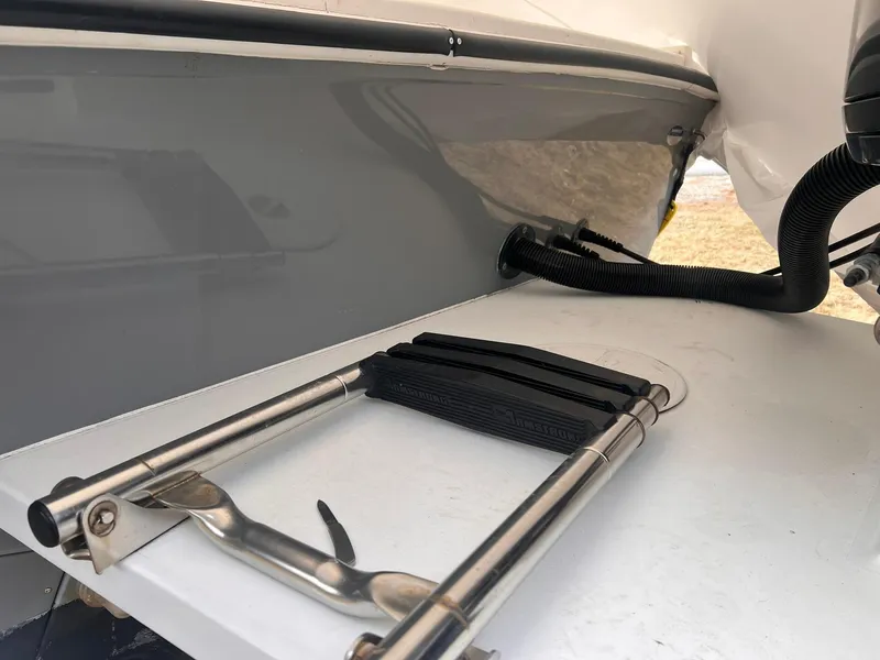 Slide: The Image of Steiger Craft 23 Miami 2016 boat with foldable ladder on deck. - 19