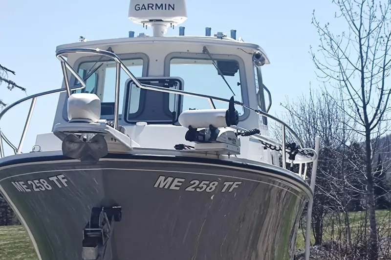 Slide: The Image of 2016 Steiger Craft 23 Miami boat with Garmin equipment, docked outdoors. - 20