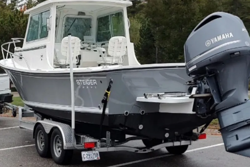 Slide: The Image of 2016 Steiger Craft 23 Miami boat on trailer with Yamaha outboard motor. - 7